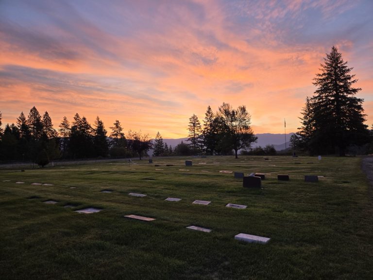 Sunset over the lawn at Grandview Cemetery