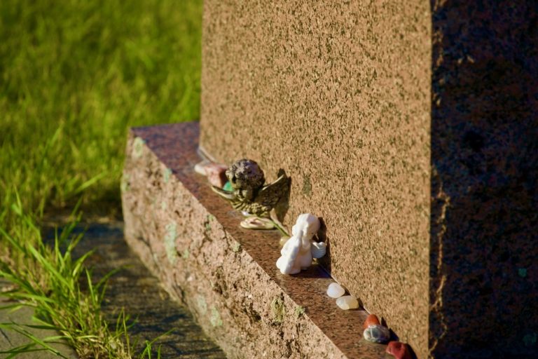 Small stones left on a headstone